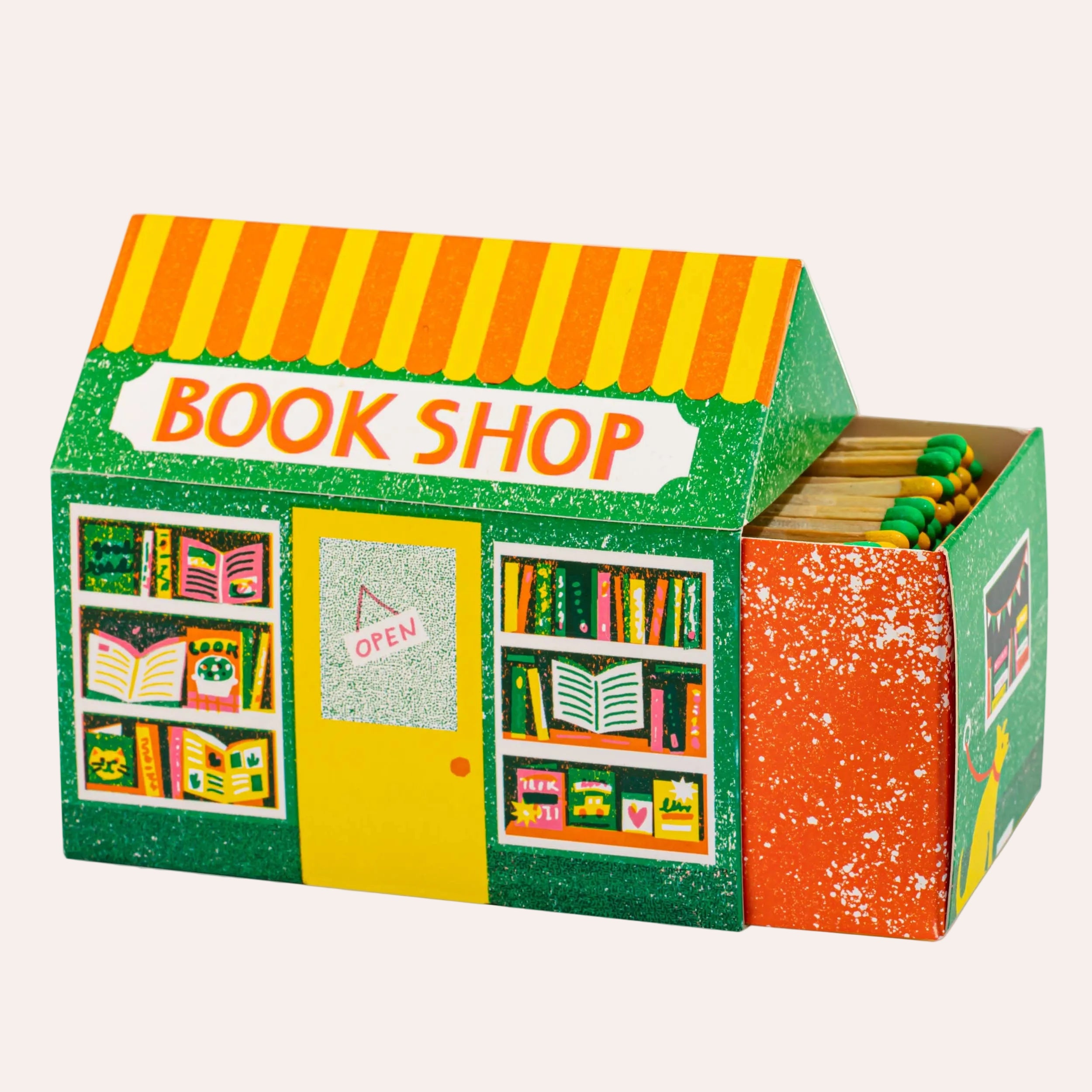 Archivist Gallery Bookshop House Matchbox with green bookshop illustration and colourful books at Thinkers &amp; Makers Melbourne