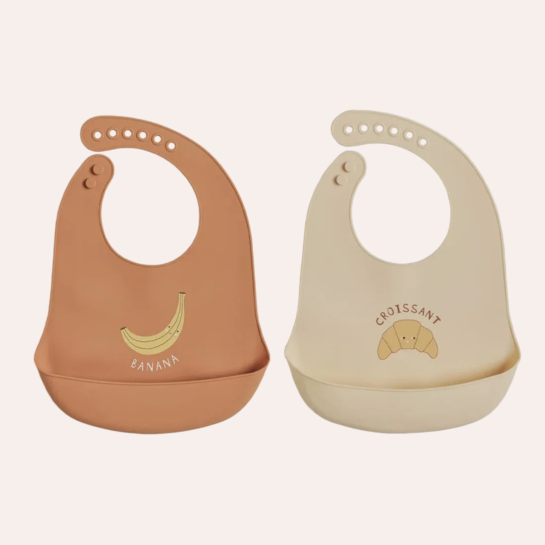 OYOY Mini Yummy silicone baby bib two pack in Caramel and Butter with food-catching pockets Banana bib and Croissant bib