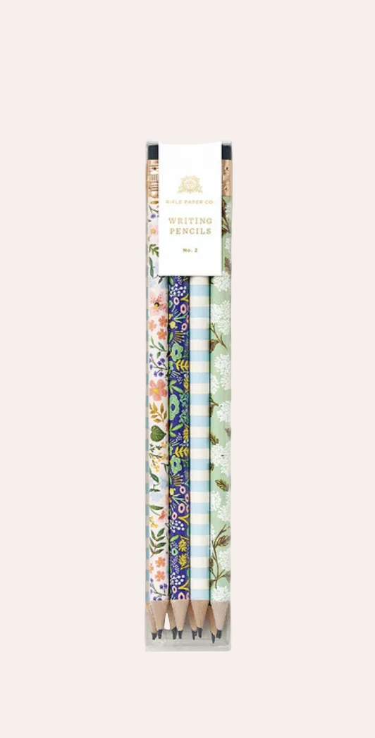 Rifle Paper Co Meadow Pencil Set with four pre-sharpened pencils in floral, botanical and blue striped designs with gold-toned ferrules and black erasers.